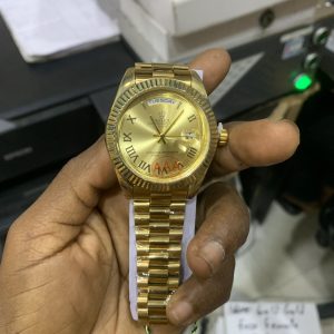 Rolex male Roman gold day and date male
