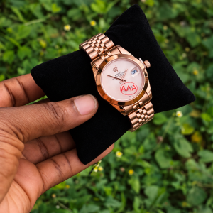 Rolex rose gold plain female watch