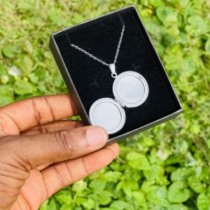 Engraved silver circle picture locket