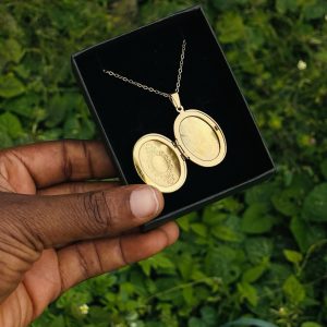 Engraved gold oval picture tattoo locket