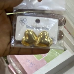Big gold love earring