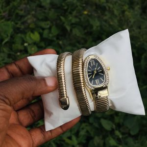 Bvlgari gold black face spiral watch
